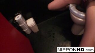 Japanese model masturbates in a public restroom